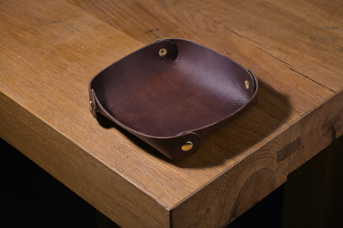 Folding Catchall with brass snaps, brown veg tan leather, hand made (folded, empty, angle shot)