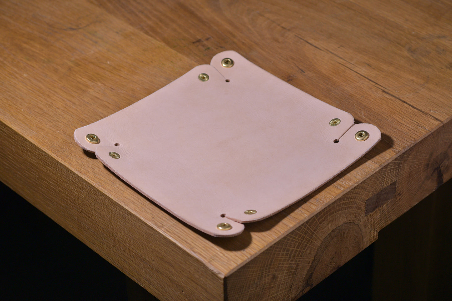 Folding Catchall with brass snaps, natural veg tan leather, hand made (unfolded/flat, angle shot)