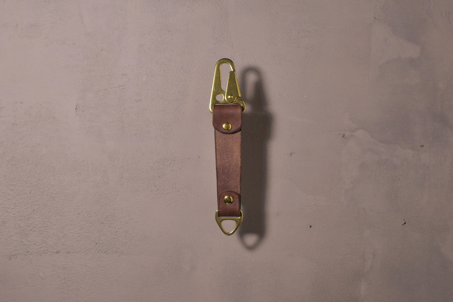 Keychain with carabiner style clip and brass hardware, brown veg tan leather, hand made (back side)