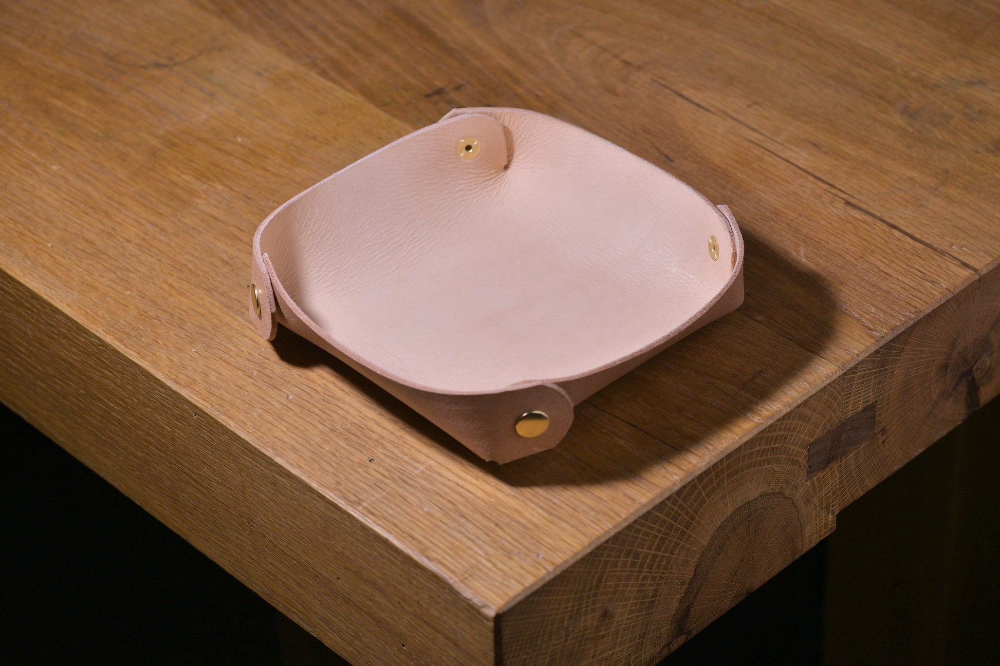 Folding Catchall with brass snaps, natural veg tan leather, hand made (folded, empty, angle shot)