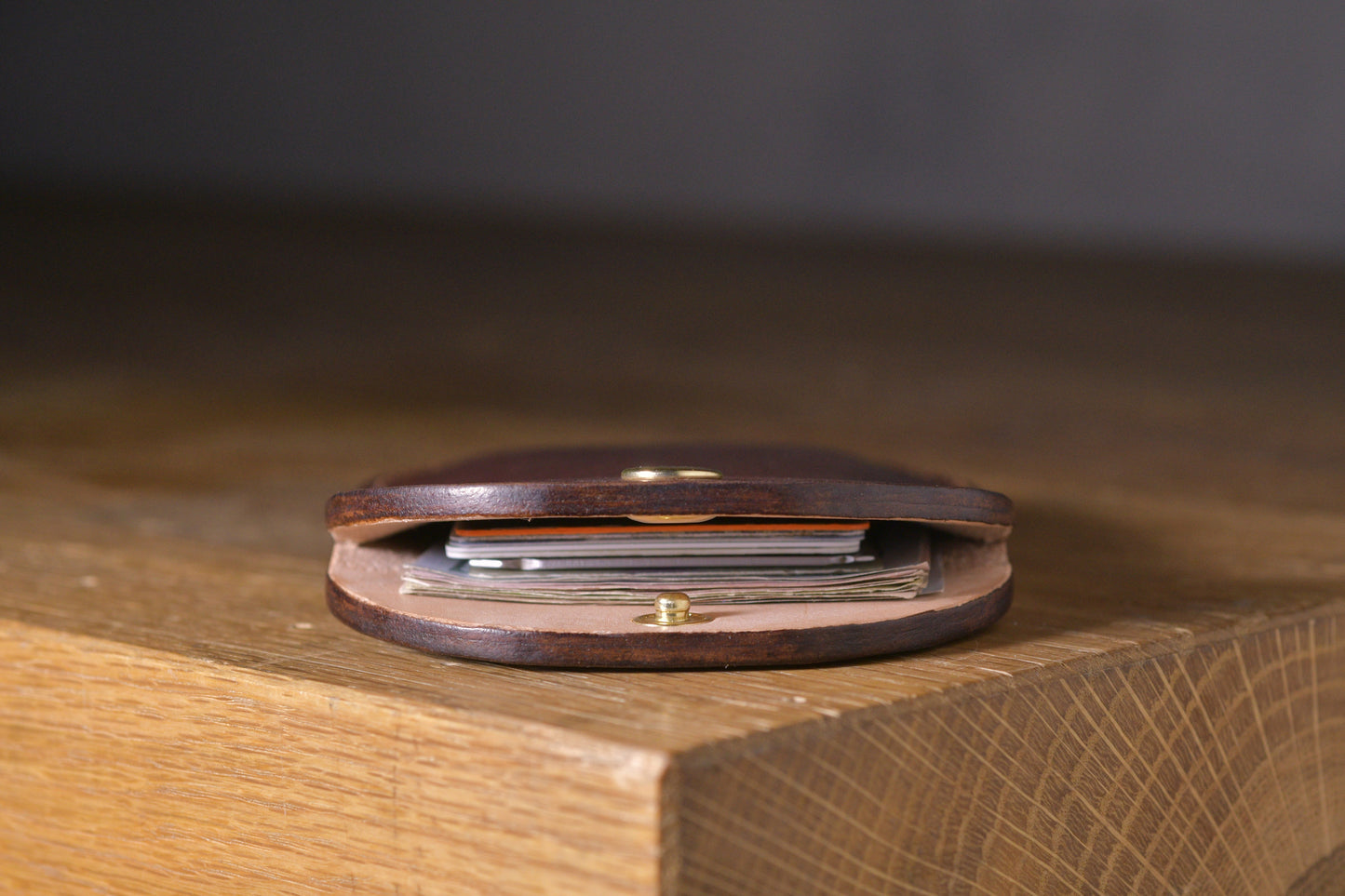 Minimal single pocket cash wallet with brass snap closure and pop open mechanism, brown veg tan leather, hand made (inside)
