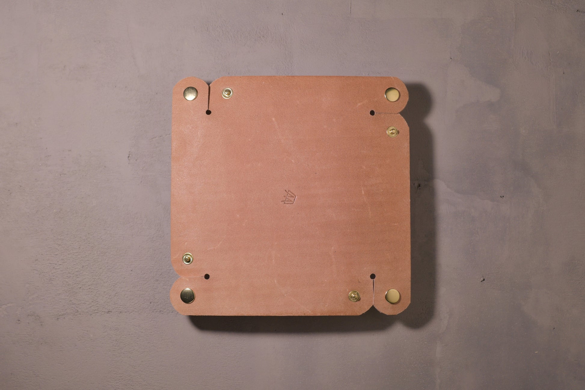 Folding Catchall with brass snaps, natural veg tan leather, hand made (unfolded/flat, back side with logo)