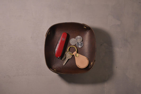 Folding Catchall with brass snaps, brown veg tan leather, hand made (folded, with keys, change and knife in it)