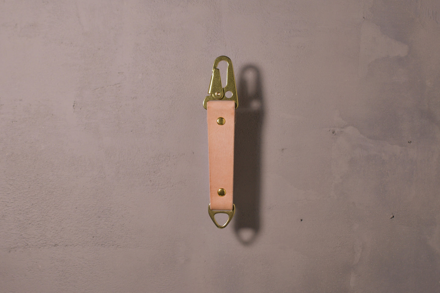 Keychain with carabiner style clip and brass hardware, natural veg tan leather, hand made