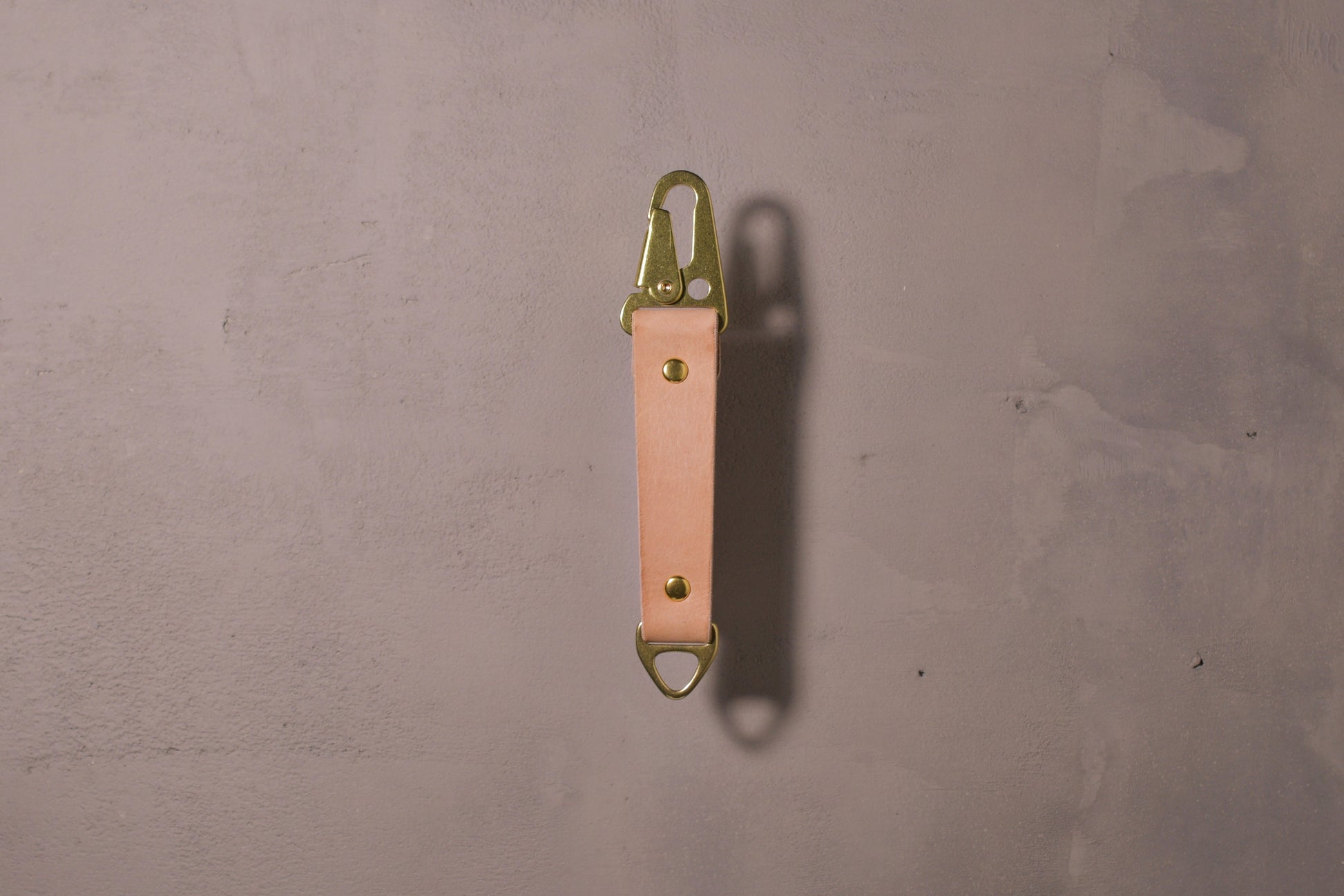 Keychain with carabiner style clip and brass hardware, natural veg tan leather, hand made