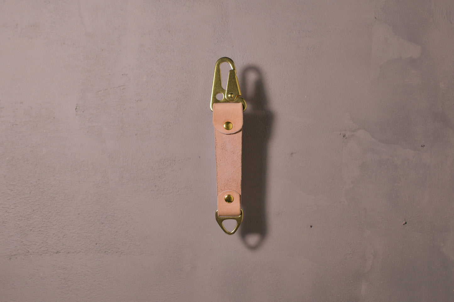 Keychain with carabiner style clip and brass hardware, natural veg tan leather, hand made (back side)