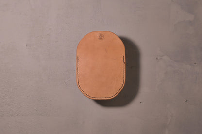 Minimal single pocket cash wallet with brass snap closure and pop open mechanism, natural veg tan leather, hand made (back)