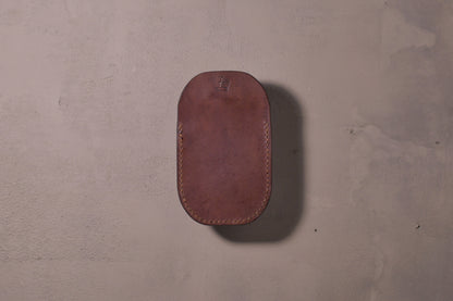Minimal single pocket card wallet with brass snap closure and pop open mechanism, brown veg tan leather, hand made (back)