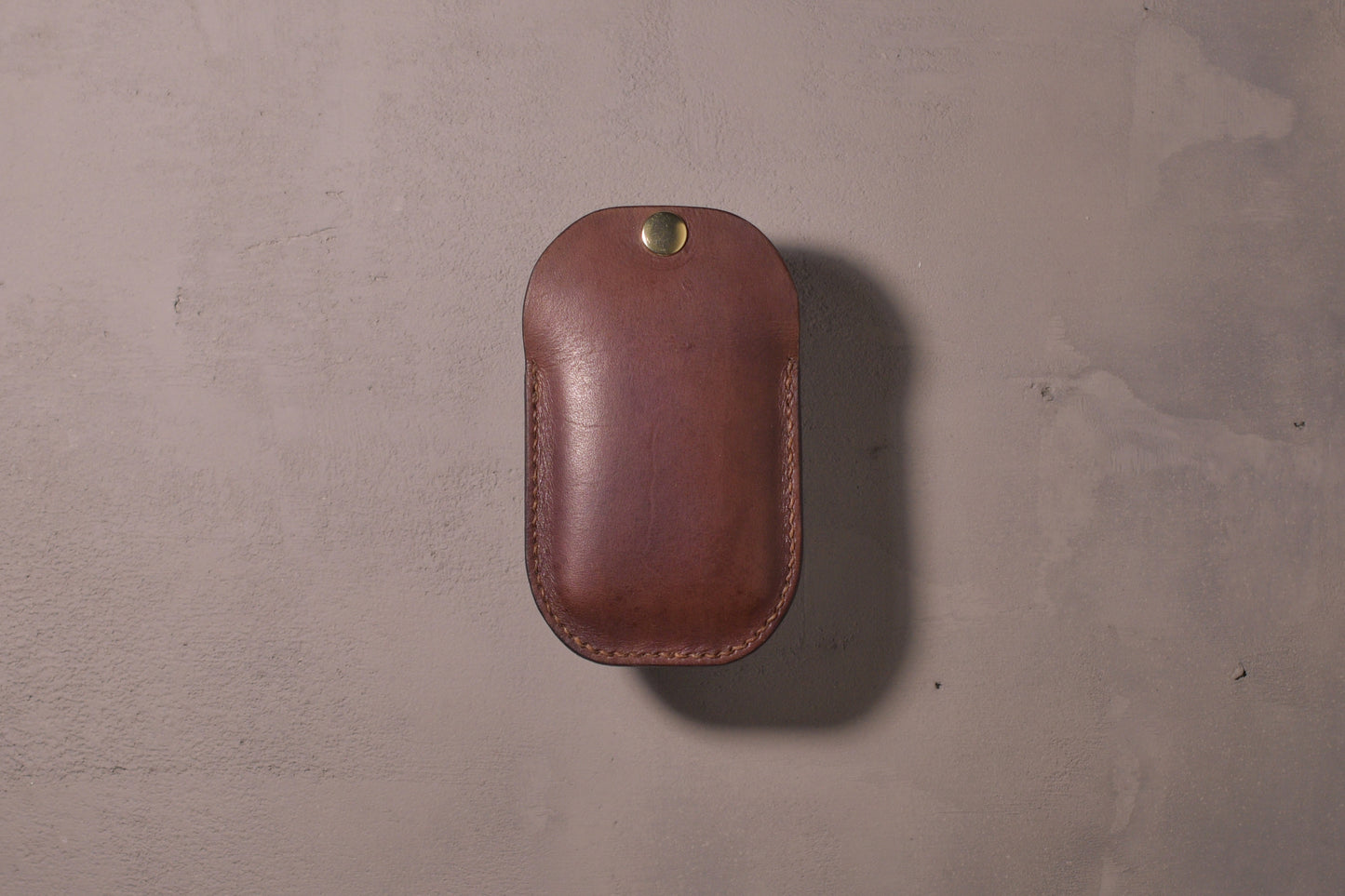 Minimal single pocket card wallet with brass snap closure and pop open mechanism, brown veg tan leather, hand made (full)