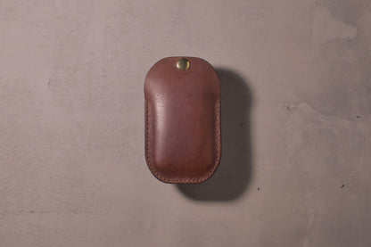 Minimal single pocket card wallet with brass snap closure and pop open mechanism, brown veg tan leather, hand made (full)