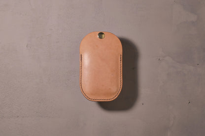 Minimal single pocket card wallet with brass snap closure and pop open mechanism, natural veg tan leather, hand made (full)